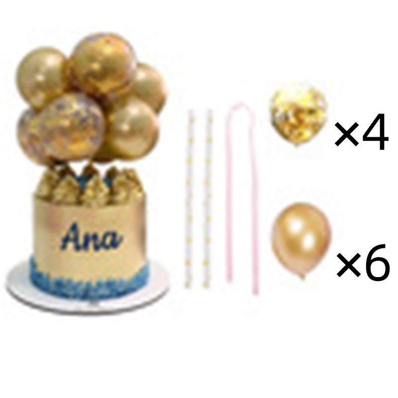 The image features a cake topped with a cluster of gold balloons, including one with confetti, along with decorative elements. The cake has a golden exterior with the name "Ana" written in blue and a blue border at the base. Surrounding the cake are additional party supplies: a set of four gold striped cake candles, a pink candle, and six gold balloons. The arrangement is designed for festive celebrations.