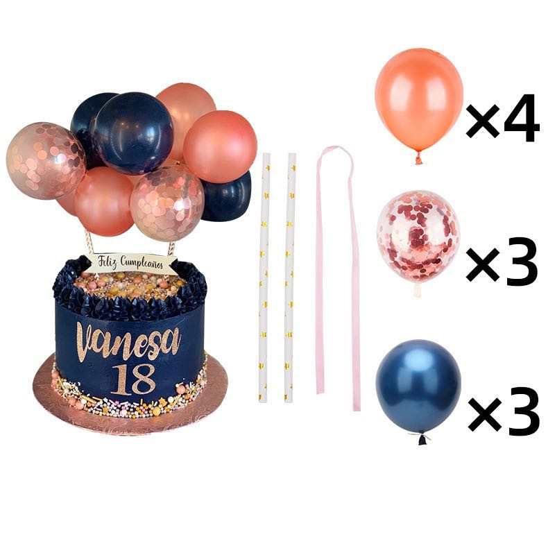 A cake with the name "Vanesa" and the number "18" on it, topped with colorful balloons. There are four balloons in shades of pink and navy, with three additional balloons featuring confetti designs. Next to the cake are three decorative straws and ribbons. The cake is decorated with colorful sprinkles and has a dark blue base with a frilled edge. A banner above the cake reads "Feliz Cumpleaños."