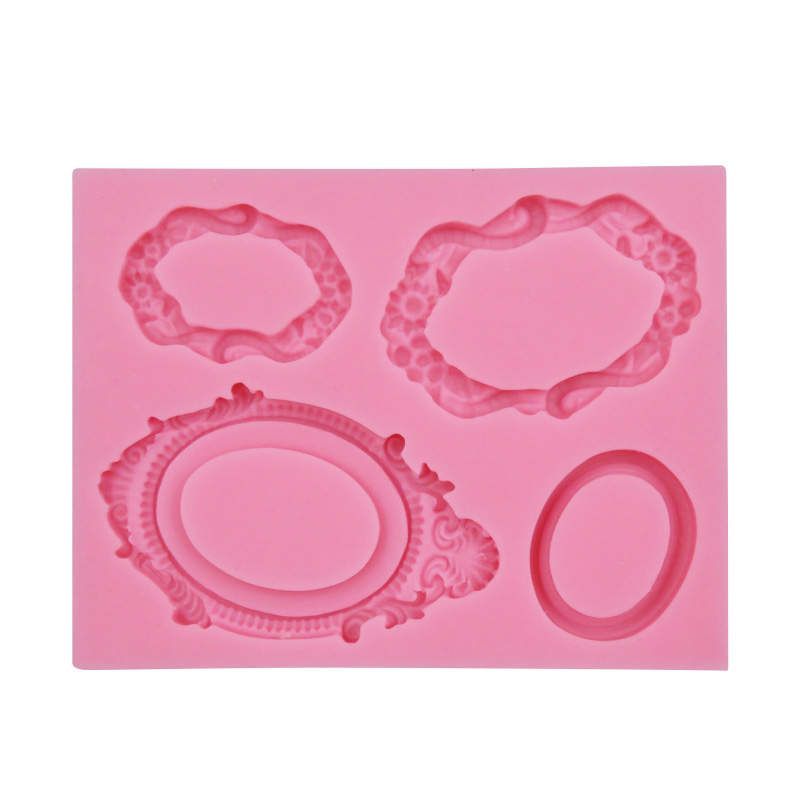 A pink silicone mold featuring various vintage mirror frame shapes. The mold includes four different designs: two ornate oval frames, one circular frame, and one floral decorative frame, all designed for creating detailed resin or craft pieces.