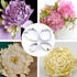 A collage featuring a set of four petal cutters arranged in a circle at the center. Surrounding the cutters are various flower creations made from fondant or similar materials, showcasing intricate designs. The flowers include a purple peony with green leaves, a pink bouquet, a white flower with a yellow center, and a yellow flower with layered petals. The overall image highlights the versatility and artistic potential of the petal cutter set.