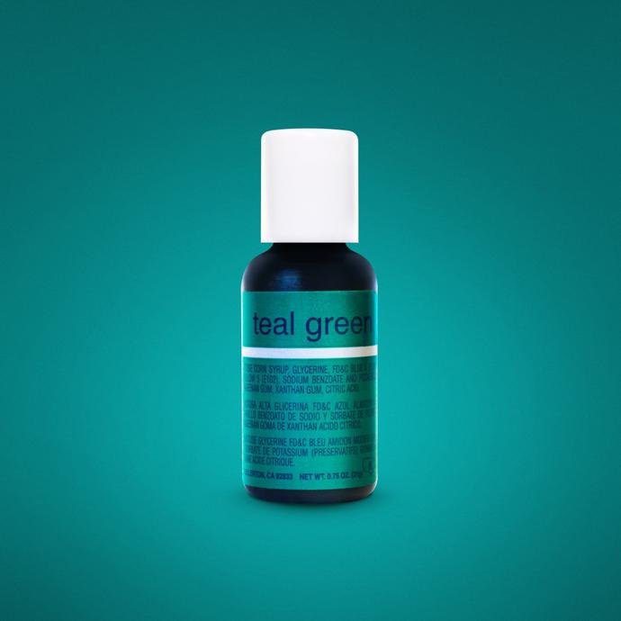 A small bottle of teal green gel food coloring with a white cap. The bottle is labeled "teal green" in a prominent, bold font on the front. The background is a solid, rich teal color. The label includes additional product information and ingredients listed in smaller text. The bottle has a net weight of 0.7 oz (20 ml).