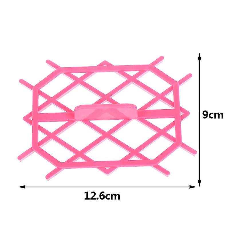 A pink quilt pattern cookie cutter displayed on a white background. The cutter has an octagonal shape with diagonal lattice lines forming a quilt-like pattern. Dimensions indicate it is 12.6 cm wide and 9 cm tall.