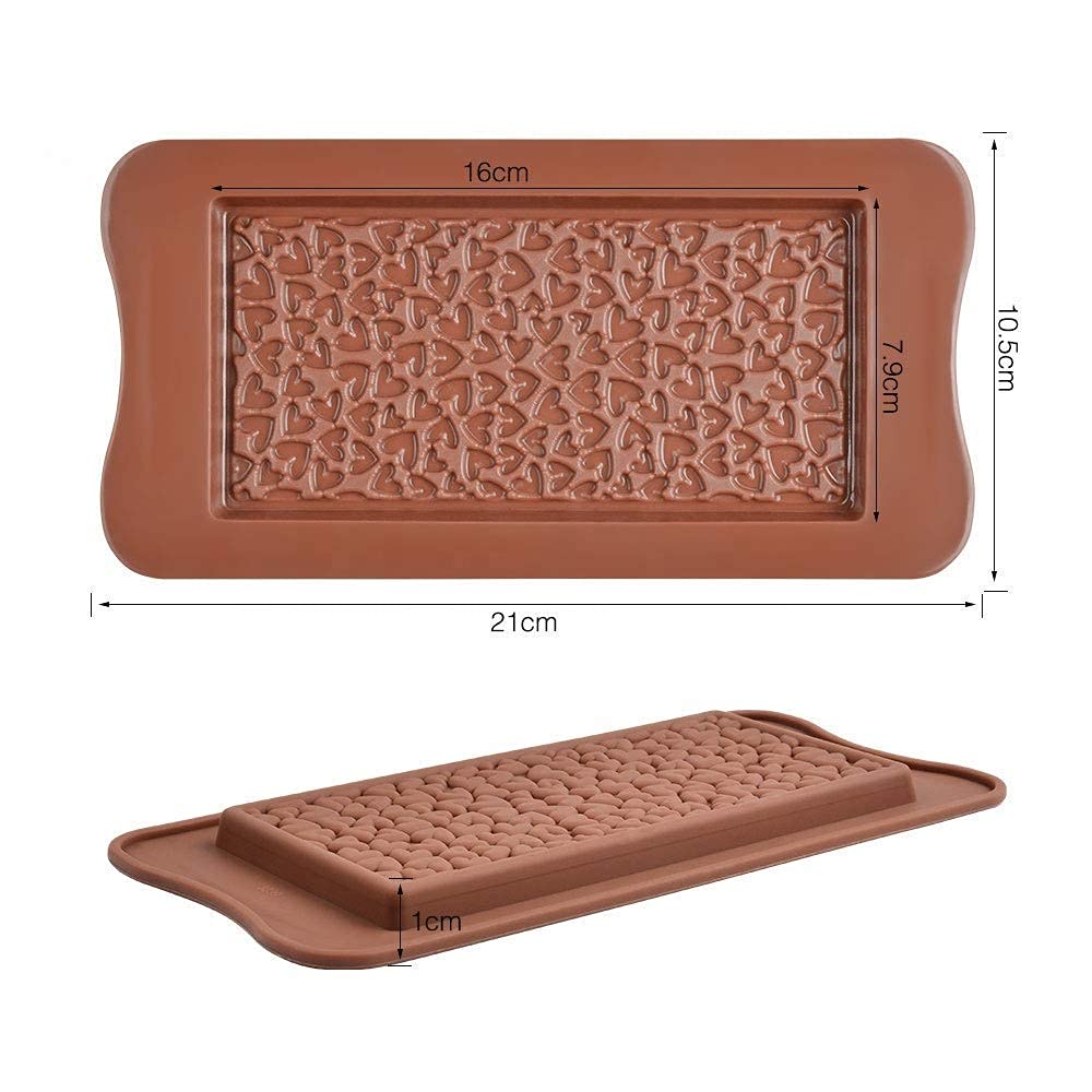 A silicone mould for making chocolate bars shaped like small hearts. The mould has a rectangular design measuring 21 cm by 10.5 cm, with a textured surface featuring numerous heart shapes in a repeating pattern. The mould is shown from two angles, highlighting its dimensions and flexible design.
