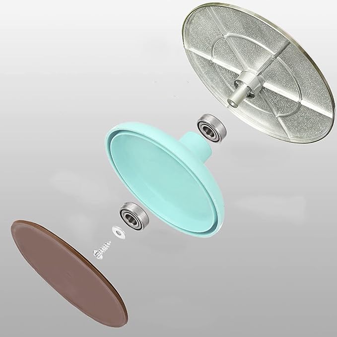 An exploded view of an aluminum revolving turntable consisting of three main components: a metallic top plate with a textured surface, a central turquoise rotating section, and a brown bottom plate. Several small hardware pieces, including bearings and a screw, are visible, illustrating the assembly of the turntable. The background is a smooth gradient from light to dark gray.