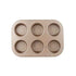 A six-cup muffin and cupcake pan with a rectangular shape, featuring six circular cavities organized in two rows. The pan has a metallic finish and a smooth surface, designed for baking muffins or cupcakes.