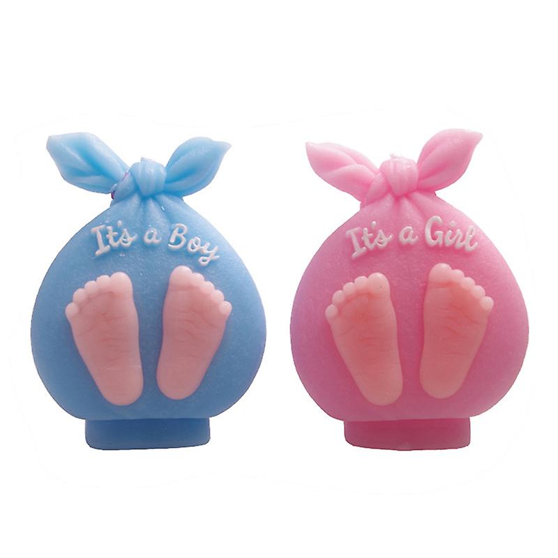 Two baby feet cutters side by side. The left cutter is blue, shaped like a bag with a bow, and has the text "It&