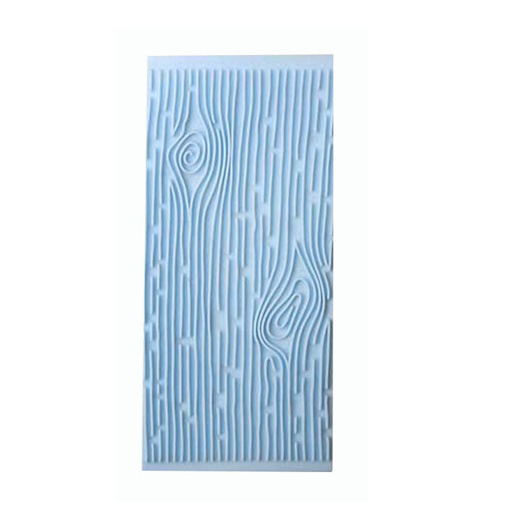 "A blue silicone mold designed to create impressions of tree bark textures. The mold features detailed patterns resembling wood grain, swirls, and lines, suitable for use in various crafting or decorative projects."