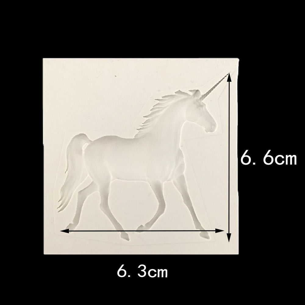 A silicone mould shaped like a unicorn horse, featuring a detailed design of the unicorn in a walking pose. The mould is square with dimensions of 6.6 cm in height and 6.3 cm in width, indicated by measurements on the sides. The mould has a smooth surface and a translucent appearance.