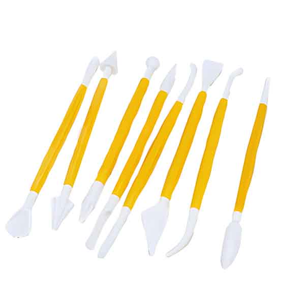 A set of nine cake decorating tools with yellow handles and white tips, featuring various shapes such as pointed, rounded, and flat ends, designed for fondant carving and decorating.