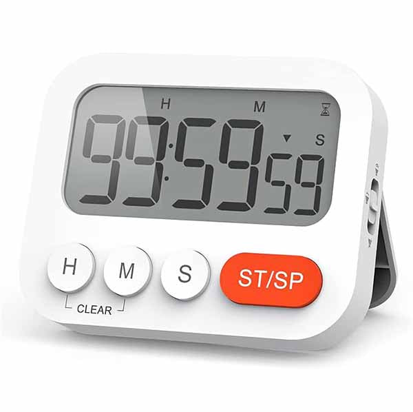 A digital timer displaying "99:59:59" on a large screen, with buttons labeled "H," "M," "S," and "CLEAR" on the bottom left. An orange button labeled "ST/SP" is positioned on the bottom right. The timer is housed in a white rectangular casing and has a foldable stand on the back for easy placement.