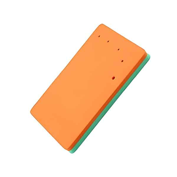 The image shows a rectangular foam pad that is 7.5 inches in size. The top surface is orange, while the bottom surface is green. The orange side features several small holes. The overall design appears simple and intended for various applications.