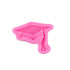A pink silicone mold shaped like a graduation cap, featuring a flat top, a wide brim, and a tassel on one side. The mold is designed for creating items in the shape of a graduation hat.