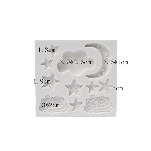 The image shows a white silicone mold designed for crafting. It features various shapes including stars, clouds, and a crescent moon. There are five stars of different sizes, two clouds, and a moon. Each shape is labeled with its dimensions, indicated in centimeters. The overall design has a playful, celestial theme suitable for creating decorative items.
