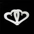 A white cookie cutter shaped like two interlocking hearts, set against a black background. The design features smooth curves and a three-dimensional appearance, highlighting the joined connection between the hearts.