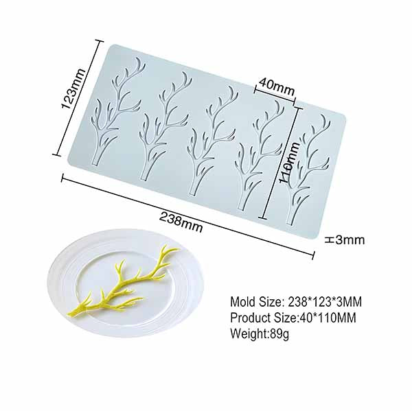 A silicone mold with precise dimensions labeled as 238 mm x 123 mm x 3 mm (9.37 inches x 4.84 inches x 0.12 inches). The mold features hollow branch-shaped designs, with one plated dessert showcasing a bright yellow branch decoration.