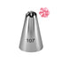 A metal piping nozzle labeled "107" with a pointed tip and multiple small openings at the top, alongside a small pink decorative flower made of piping.
