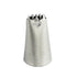 A stainless steel piping nozzle, shaped like a tapered cone. The top features jagged edges, indicating a decorative design for icing or piping. The nozzle has a smooth metallic surface.