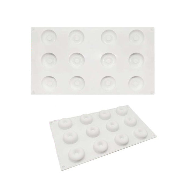 A white silicone mold with 12 circular cavities designed for making mini donuts. The mold has a smooth surface and is shown from two angles, with the top view displaying the cavities clearly.