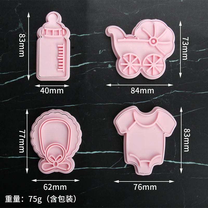 A 4-piece set of baby-themed cookie cutters displayed on a dark surface. The cutters are in pink silicone and include a baby bottle (40mm x 83mm), a baby stroller (84mm x 73mm), a bib (62mm x 77mm), and a baby onesie (76mm x 83mm). Each cutter has a distinct shape for creating fun, baby-themed cookies or pastries.