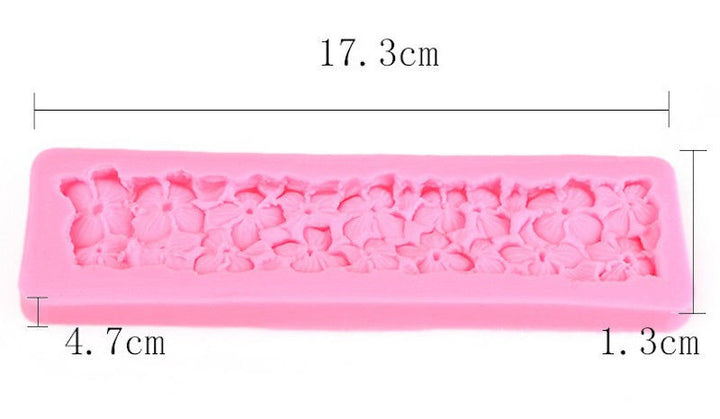 A pink silicone mould designed for hydrangea flowers, measuring 17.3 cm in length, 4.7 cm in width, and 1.3 cm in height. The mould features detailed flower patterns of hydrangeas embossed on its surface.