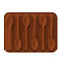 A brown silicone mold shaped like six spoons, all arranged in a rectangular format. The spoons have a rounded bowl and elongated handle, designed for creating spoon-shaped treats or chocolates.