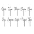 Image shows a collection of cake toppers designed for celebrating ages, featuring the words "One," "Two," "Three," "Four," "Five," "Six," "Seven," "Eight," "Nine," and "Ten" in an elegant, cursive font. Each word is attached to a slender stick for placement on a cake. The toppers are arranged in two rows, with five words in each row.
