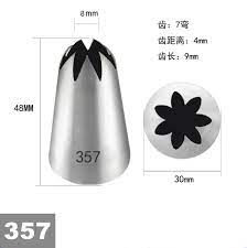 Image depicting a piping nozzle labeled "357". The nozzle has a tapered, silver metallic design with a fluted opening at the top, featuring six pointed edges. To the right, there is a circular diagram showing the nozzle?s tip, which resembles a flower shape. Dimensions of the nozzle are indicated: a height of 48 mm, a base diameter of 30 mm, and an opening size of 7 mm.