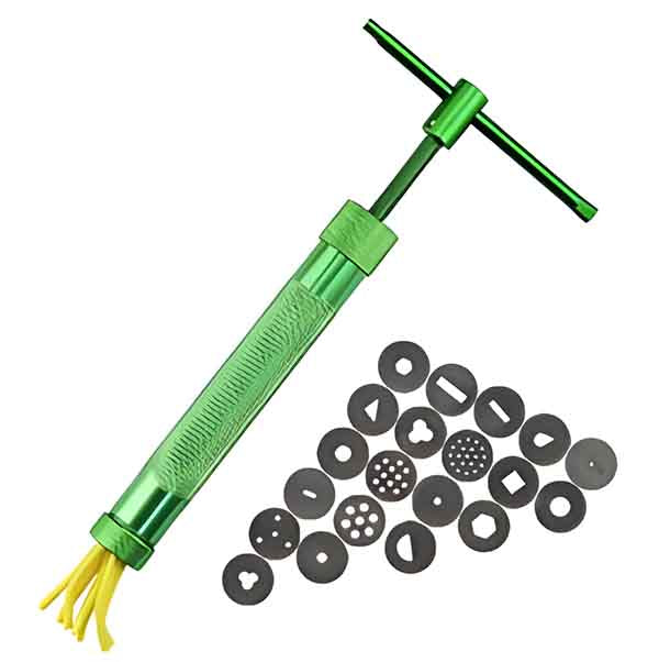 A green metal clay extruder is shown, featuring a cylindrical body with a textured grip and a T-handle at the top. Yellow clay is visible at the extruder&