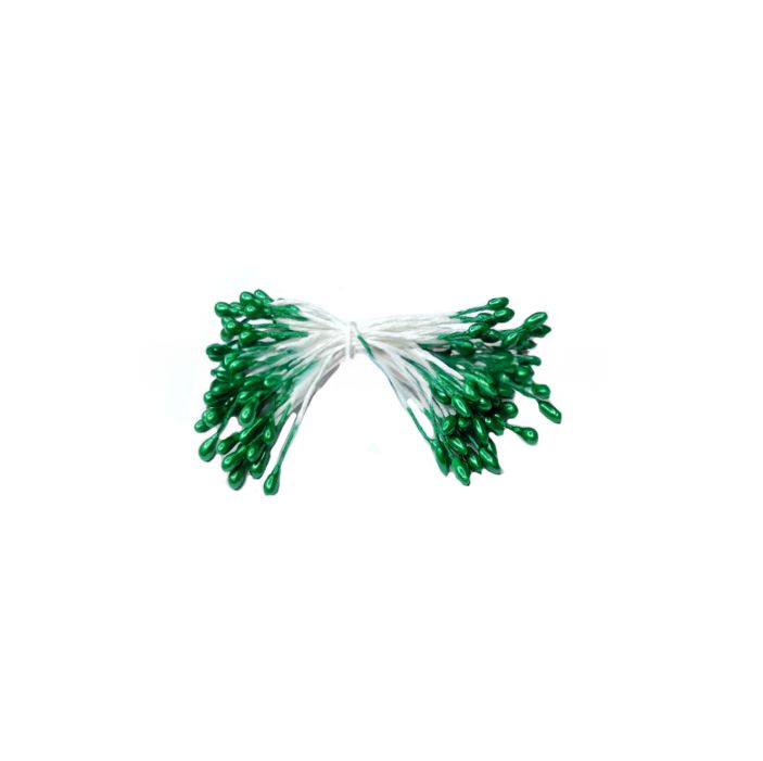 A bundle of green-tipped floral stamens bound together against a white background. The arrangement is symmetrical, evoking a sense of neatness and order.