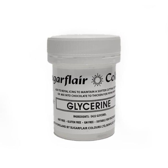 A round container of Sugarflair Glycerine, 45gm, with a white lid. The label features the brand name "Sugarflair" and "Glycerine" prominently displayed. Additional details on the label include usage instructions, ingredients (E422 Glycerol), and notes indicating it is nut-free, gluten-free, GM-free, and suitable for vegetarians. The container is clear, allowing the contents to be partially visible.