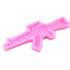 A pink silicone mold in the shape of a rifle, designed for crafting or baking purposes. The mold features detailed contours that resemble the body of the gun, including the barrel and stock, and is set against a plain background.