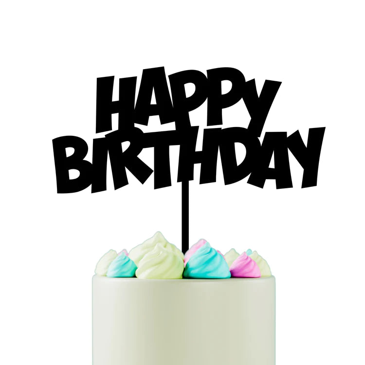 A white cake topped with a black "HAPPY BIRTHDAY" cake topper. The cake is adorned with pastel-colored, swirled frosting in pink, blue, and green shades. The background is plain white, emphasizing the cake and topper.