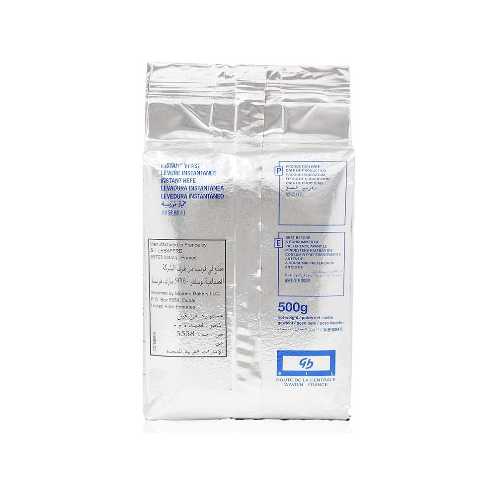 Silver 500g package of instant yeast with text in multiple languages, including English and Arabic. Packaging gives a utilitarian, practical vibe.