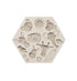 An image of a hexagonal silicone mold featuring various jungle animal faces. The mold includes detailed impressions of a giraffe, elephant, lion, monkey, and bird, along with animal paw prints and a leaf design. The mold is a light beige color and has raised features for each animal, making it suitable for crafting or baking purposes.