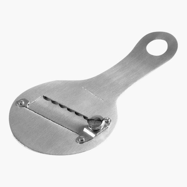 A stainless steel truffle chocolate shaver with a rounded blade and an adjustable knob. The shaver features a handle with a loop for easy hanging. The blade has a series of grooves for shaving chocolate or truffles. The overall design is sleek and modern, highlighting its functionality.