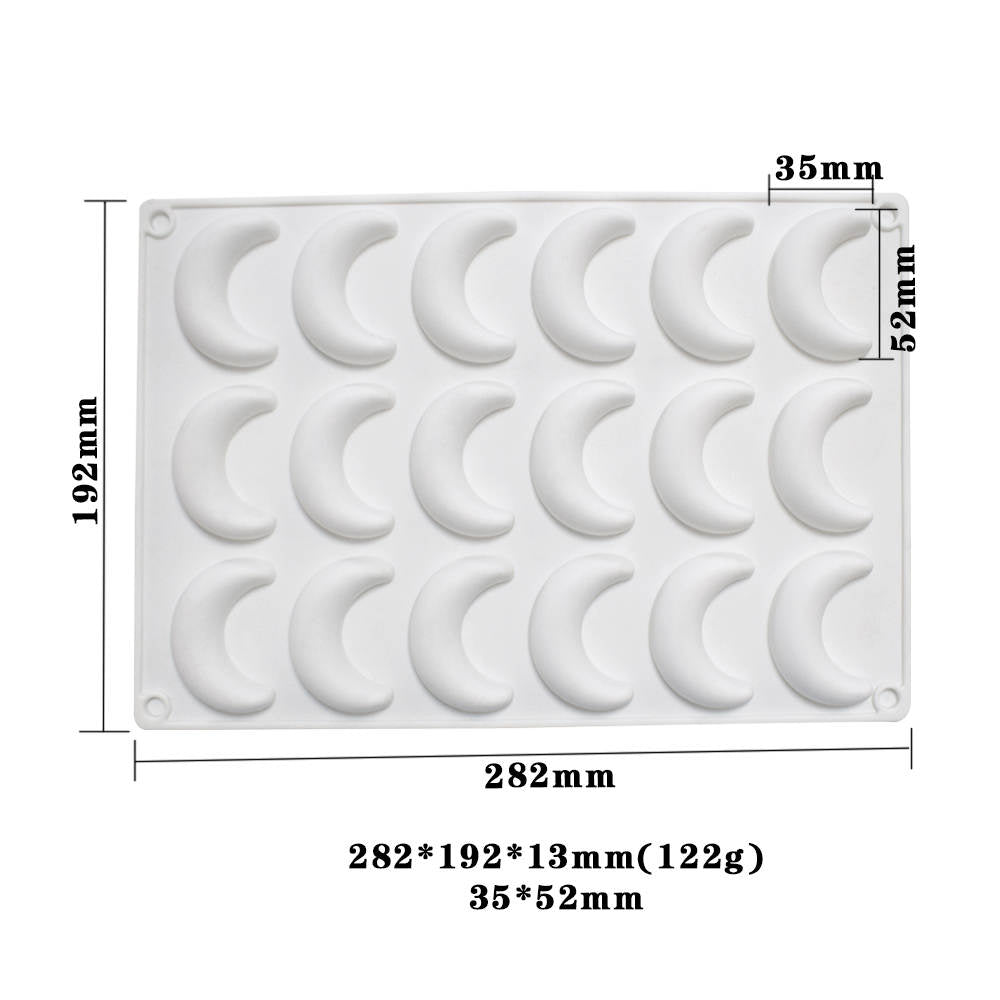 The image shows a white silicone mold featuring 18 crescent moon shapes. The mold is rectangular and measures 282mm in width and 192mm in height. Each crescent moon cavity is approximately 35mm wide and 52mm tall. The mold is flexible and designed for baking or crafting purposes. Measurements and cavity details are displayed on the side of the mold for reference.