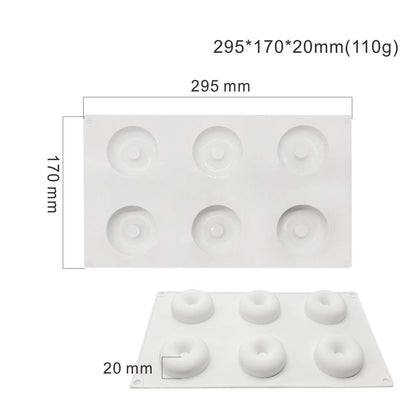 The image features a white silicone mould designed to create six donut-shaped cavities. The mould is rectangular, with measurements displayed as 295 mm in width and 170 mm in height, and a depth of 20 mm. Each cavity has a small circular hole in the center to form the classic donut shape. The overall appearance is smooth and flexible, ideal for baking or crafting donuts.