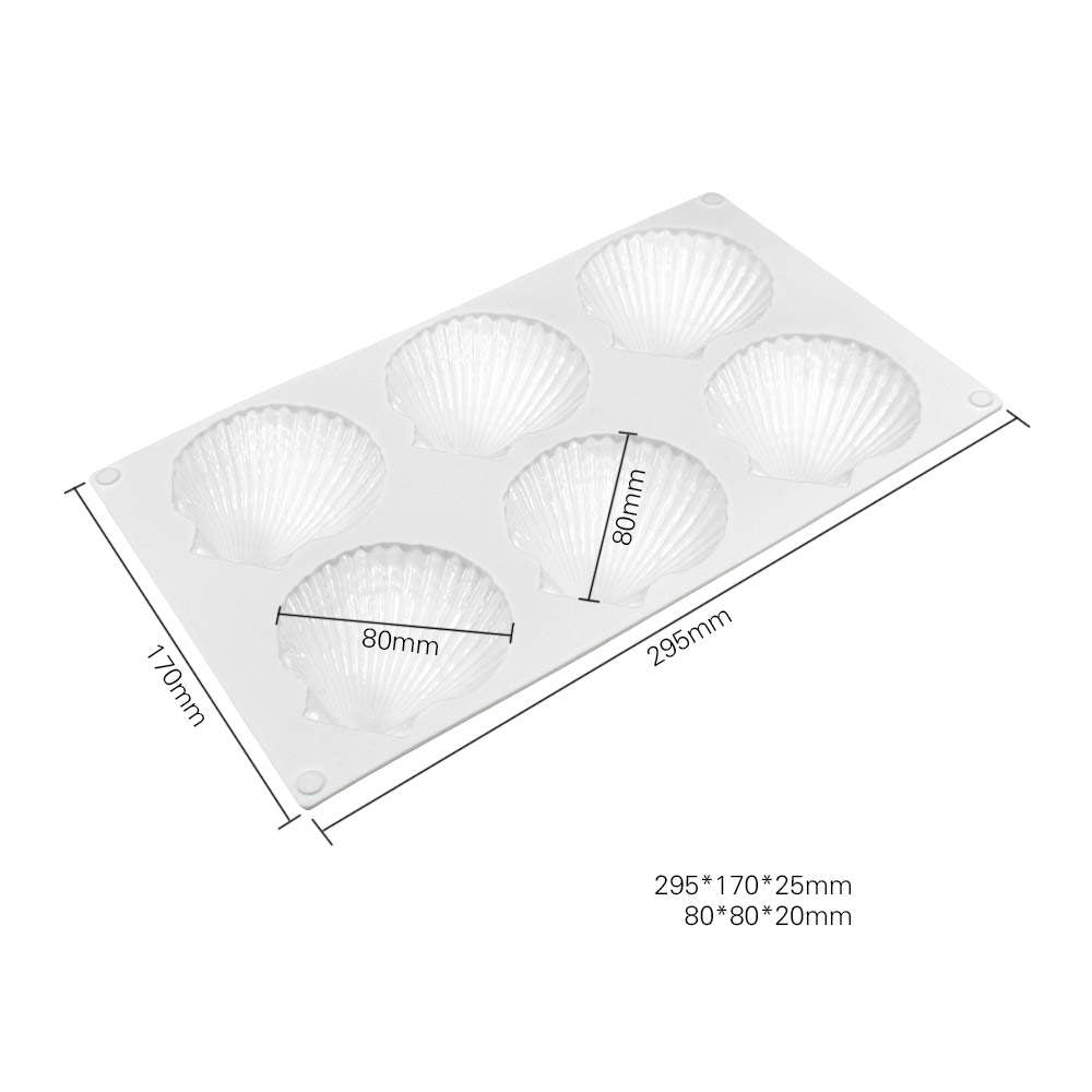 A white silicone mould featuring six shell-shaped cavities arranged in two rows. The mould dimensions are 295mm by 170mm and the shell cavities measure 80mm by 20mm. There are measurement markings along the sides of the mould.