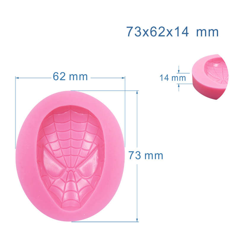 "A pink silicone mold shaped like a Spider-Man face, measuring 73mm by 62mm and 14mm deep. The mold features detailed facial features and a web design, with dimensions indicated on the image."