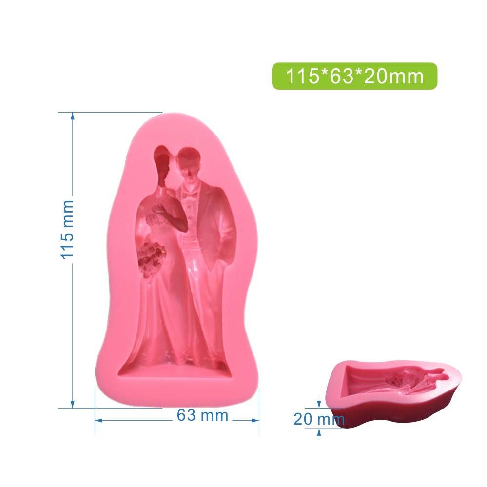 A pink silicone mould shaped like a bride and groom couple. The mould measures 115 mm in height, 63 mm in width, and 20 mm in depth. Next to it, a smaller, separate mould is also shown. The figures appear detailed and are designed for creating cake or craft decorations.