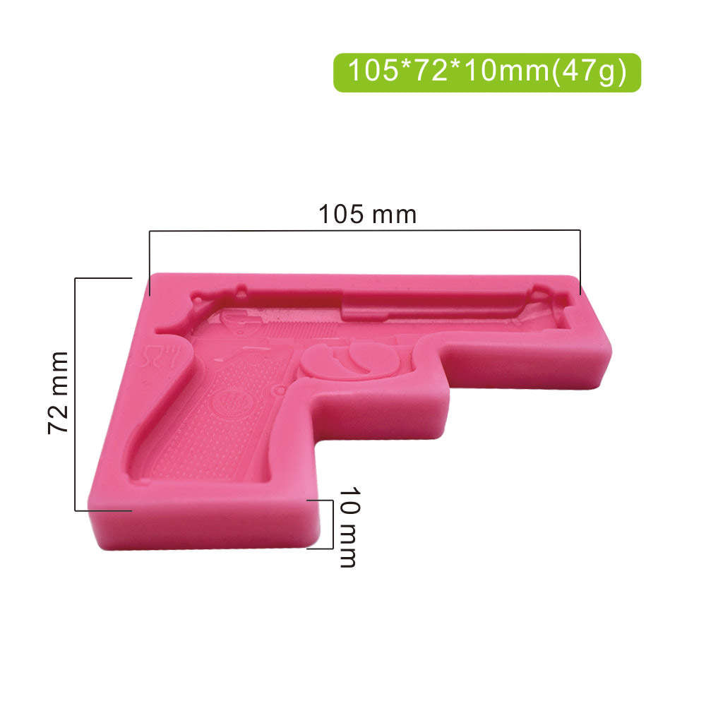 A pink silicone mold shaped like a pistol, measuring 105 mm in length, 72 mm in height, and 10 mm in depth. The mold has detailed engravings of a gun design, suitable for creating 3D shaped items. Dimensions and weight (47 grams) are indicated in the image.