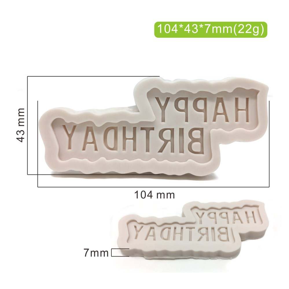A silicone mold shaped with the words "HAPPY BIRTHDAY" embossed on its surface. The mold measures 104 mm in length, 43 mm in height, and 7 mm in thickness. It has a soft, flexibly textured surface and is a light color.