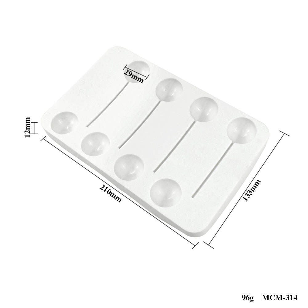 The image shows a white silicone mold designed for creating lollipop balls. It features a rectangular shape with six circular cavities for the lollipop balls, each with a diameter of 29mm. The mold has a thickness of 12mm and dimensions of 210mm in length and 133mm in width. There are lines indicating the measurements on the sides, and the overall design is simple and functional for candy making.