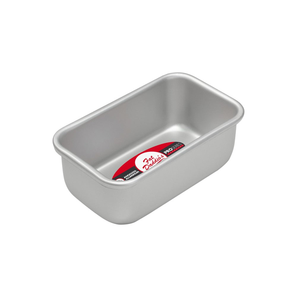 A silver aluminum bread pan with straight sides and a smooth finish. The pan features a red and white label that reads &quot;Fat Daddio&