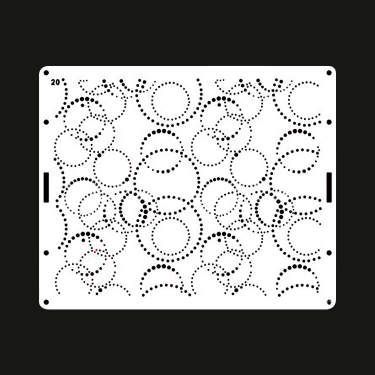 The image shows a rectangular cake stencil featuring a decorative pattern of overlapping circles and dotted outlines. The stencil is white and has small holes arranged in a swirling design, creating an intricate visual effect. Two handles are on the sides for easy handling. The background is dark, highlighting the stencil&