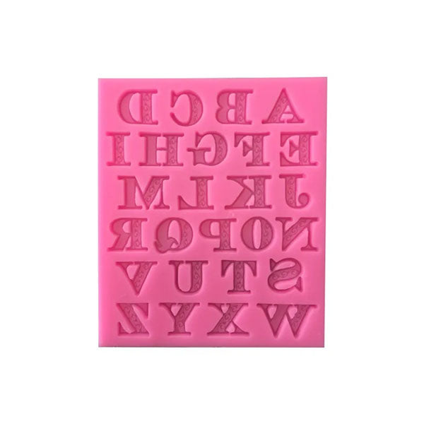 A pink silicone mold featuring a complete set of uppercase letters A to Z arranged in a grid pattern. Each letter is raised and has an ornate design.