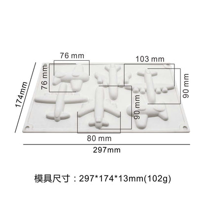 A white silicone mould designed to create 3D airplane shapes. The mould features several airplane designs, with measurements indicated around the edges. The overall dimensions of the mould are 297mm x 174mm x 13mm, and it weighs 102g.