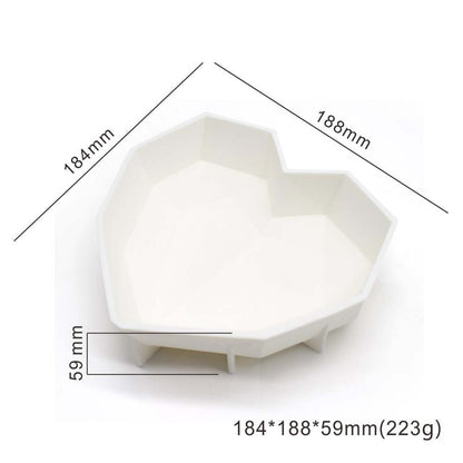 A white heart-shaped piñata mold with a geometric design, measuring 184mm by 188mm and 59mm in depth. The mold is shown from a top-down perspective, displaying its shape and dimensions. The weight of the mold is indicated as 223g.