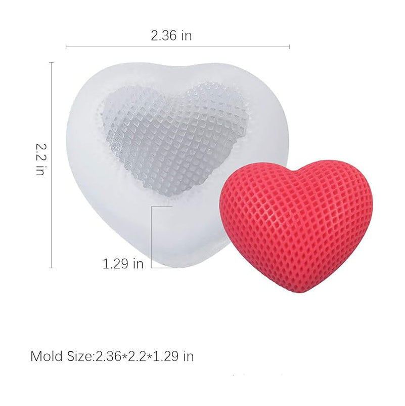 A silicone heart mold measuring 2.36x2.2x1.29 inches sits beside a textured red heart shape. The white mold and red piece contrast vividly.