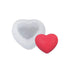 Two heart-shaped sponges with textured surfaces are shown. One is white and larger, the other is smaller and red, conveying a simple, cheerful tone.